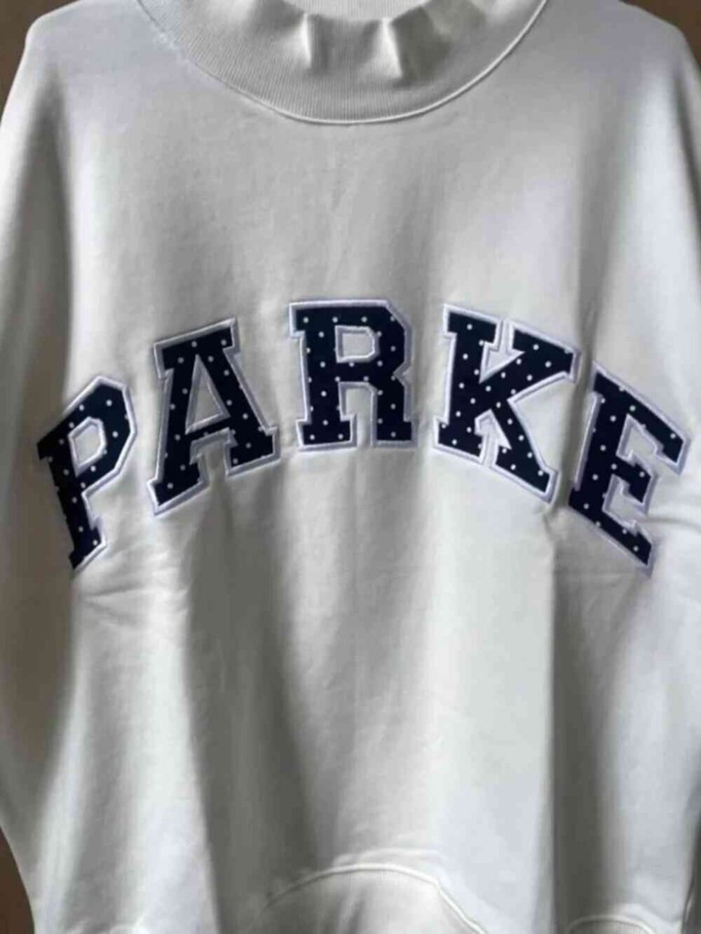 šWhite Mock Neck Sweatshirt | Parke Dotted Navy Applique Logo - Picture 3 of 6